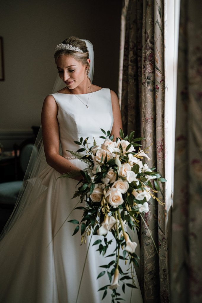 Charlotte Elizabeth Bridal Shop dress with flowers from the Chatsworth House Gardens.